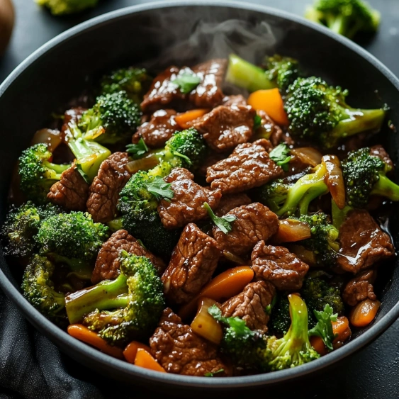 A bowl of beef and broccoli.