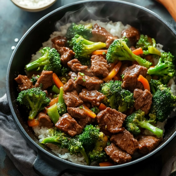 A bowl of beef and broccoli.